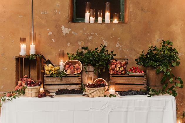 Fermenting Cellar Toronto Wedding Photographer. The couple opted for a healthy sweets table lavished with peaches, cherries and an assortment of berries styled on upturned wooden crates and displayd in woven baskets.