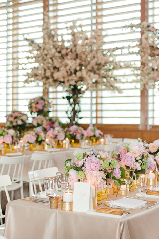 AGO Toronto Wedding Photography. Blush florals, gold accents and mauve table cloths create a sweet, elegant and stylish decor.
