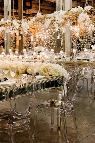 Lush all white flower decor at this Fermenting Cellar wedding
