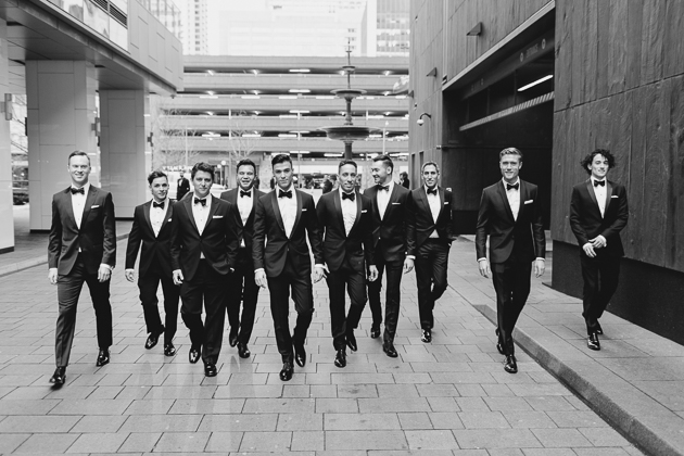 A couple and their groomsmen stopping traffic in the streets of Toronto