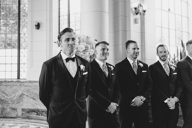 Groom's reaction at the ceremony altar