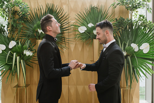 The grooms exchanged personalized vows at their Royal Conservatory of Music wedding in Toronto