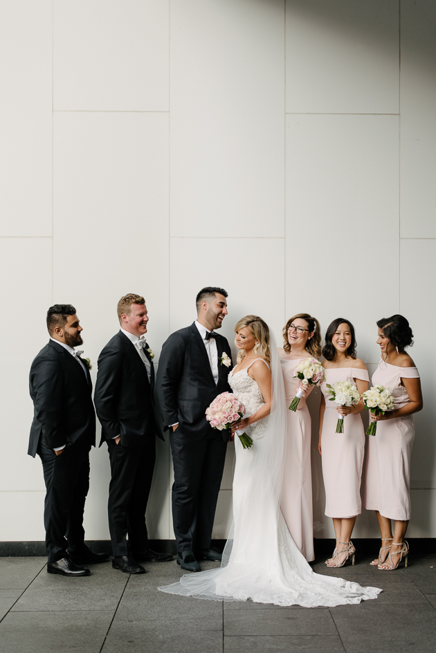 Bride and groom wedding photos near Four Seasons Hotel Toronto