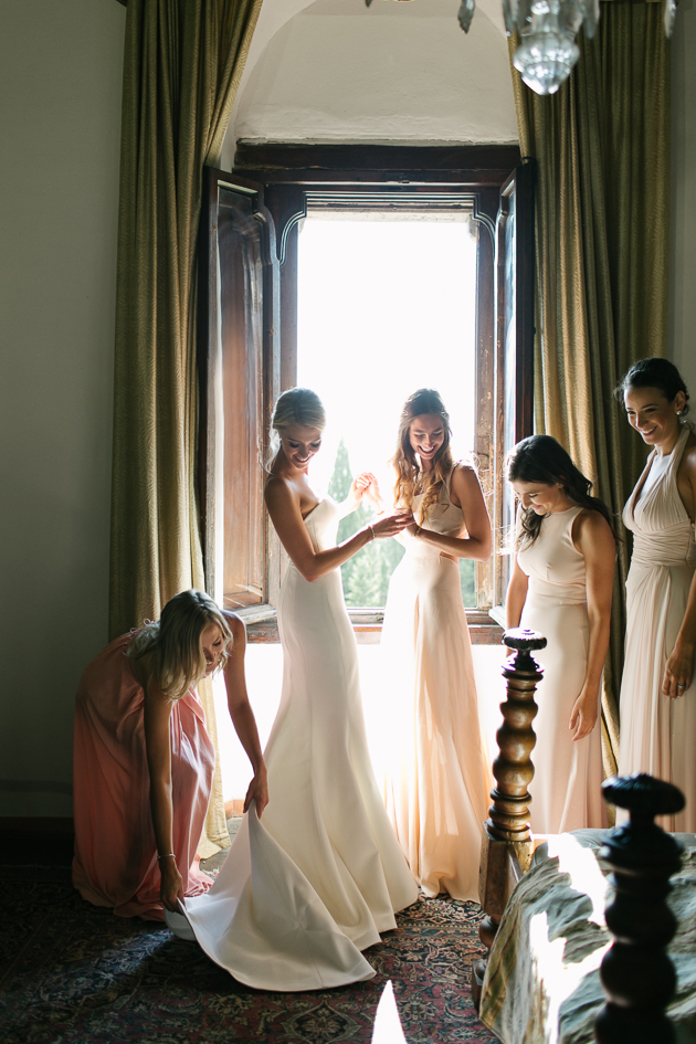 Bridesmaids getting ready on the morning of the wedding in Florence, Italy